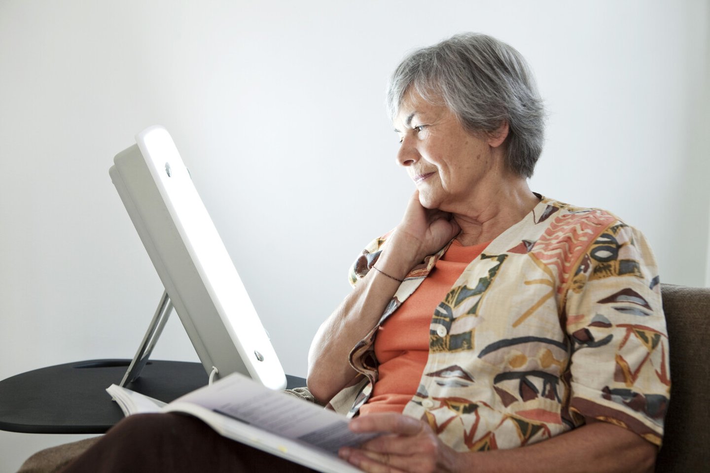 Elderly Person Light Therapy; Shutterstock ID 174165995