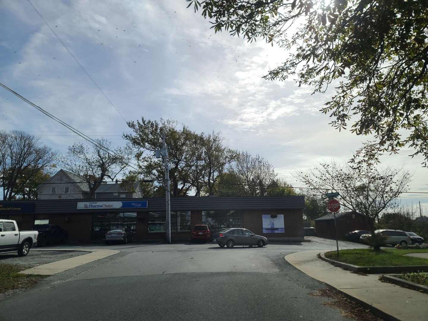 Lockeport NS, CAN, October 14, 2022 - A wide open empty street in Lockeport NS on a cloudy autumn day. PharmaChoice is ahead.; Shutterstock ID 2217309741