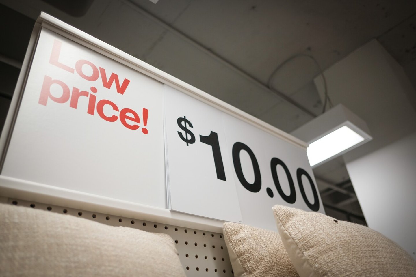 Austin, TX, USA - 30 May 2024 - A sign in a Target retail store to advertise lower prices; Shutterstock ID 2527461317